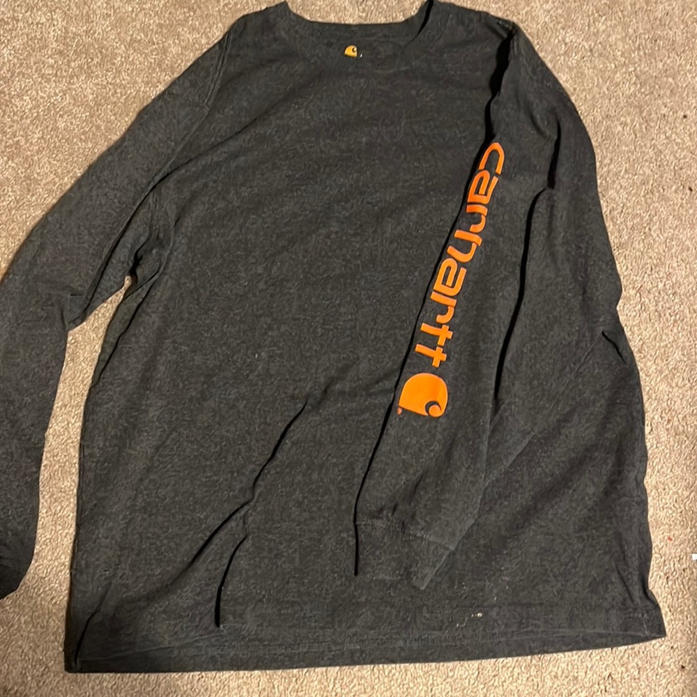 Thick grey and orange long sleeve shirt.